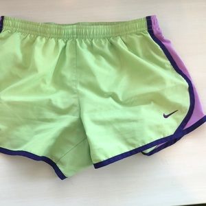 Green and purple Nike shorts